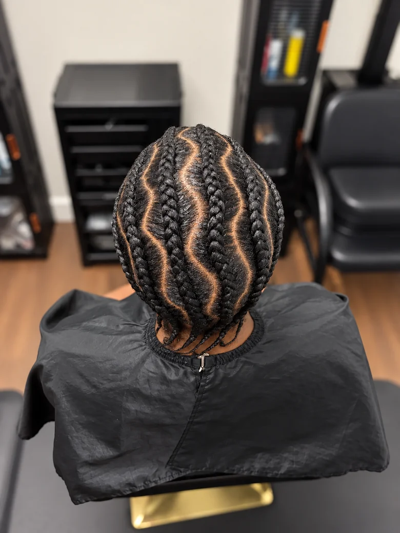 Zig-zag feed-in cornrows from above