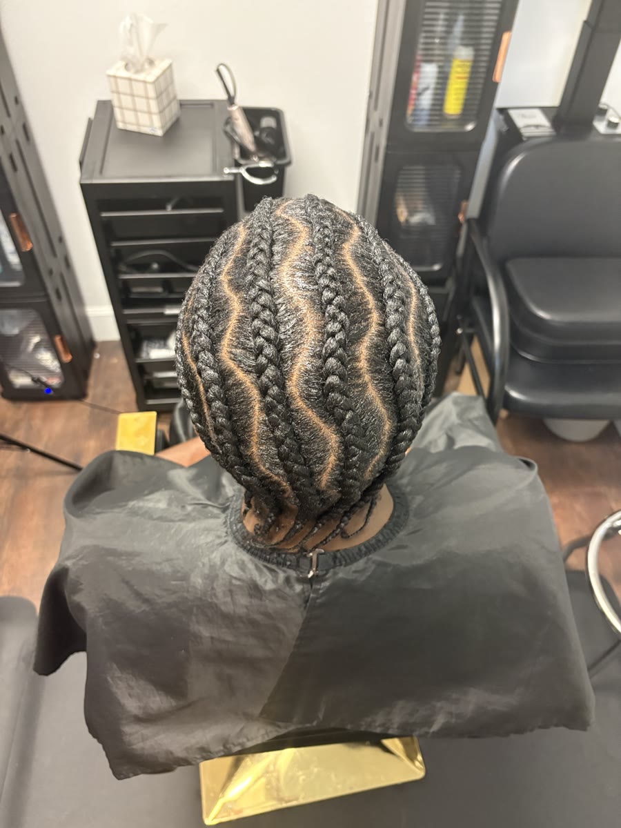Curved zig-zag feed-in cornrows